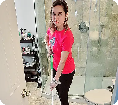 cleaner cleaning bathroom floor maid service