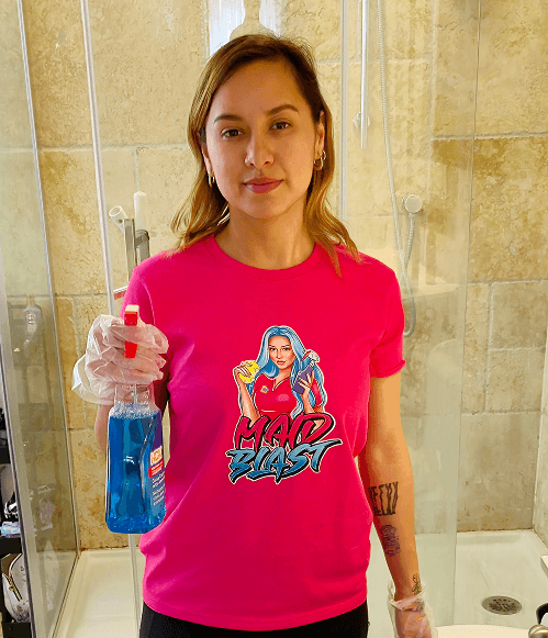 Residential cleaner cleaning shower glass during a house condo cleaning service.